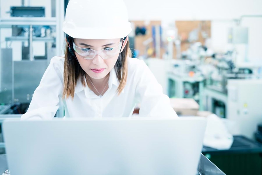 Engineer Documenting On Laptop